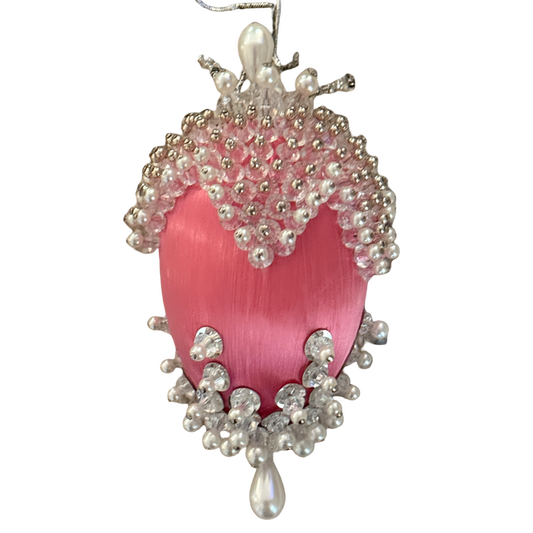 Vintage oval pink satin ornament with scalloped clear beads, pearl-look trim, silver-tone accents, and a teardrop at the base.