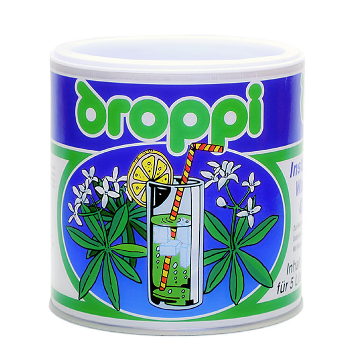 Wela Droppi Waldmeister Geschmack - eine Dose mit bunten Illustrationen auf dem Etikett